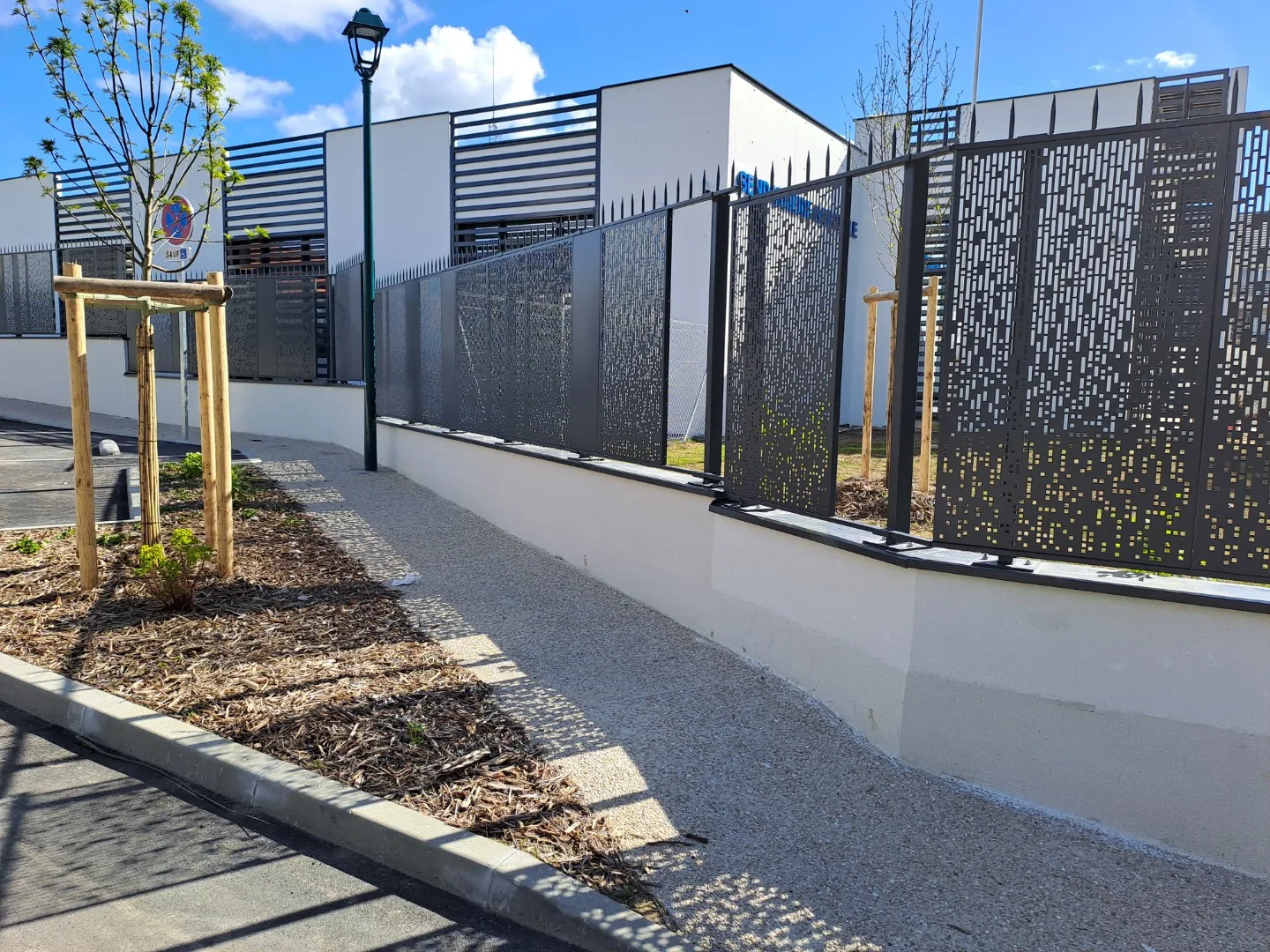 Clôture barreaudée sur muret, réalisation ACS